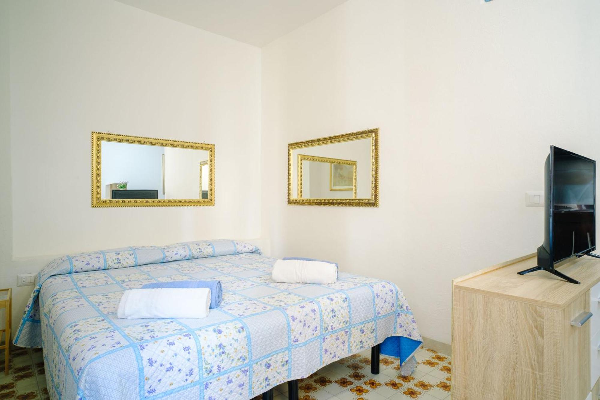 Bed - Palazzo Urbe Apartment Olbia